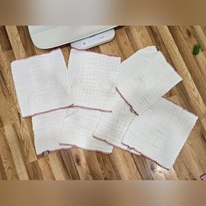 White Quilted Cloths with Red Trim